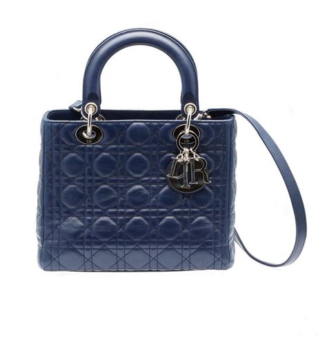 navy lady dior handbags bloggers outfits|Dior leather bag.